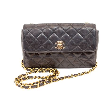 black quilted chanel|Black Chanel cross body bag.